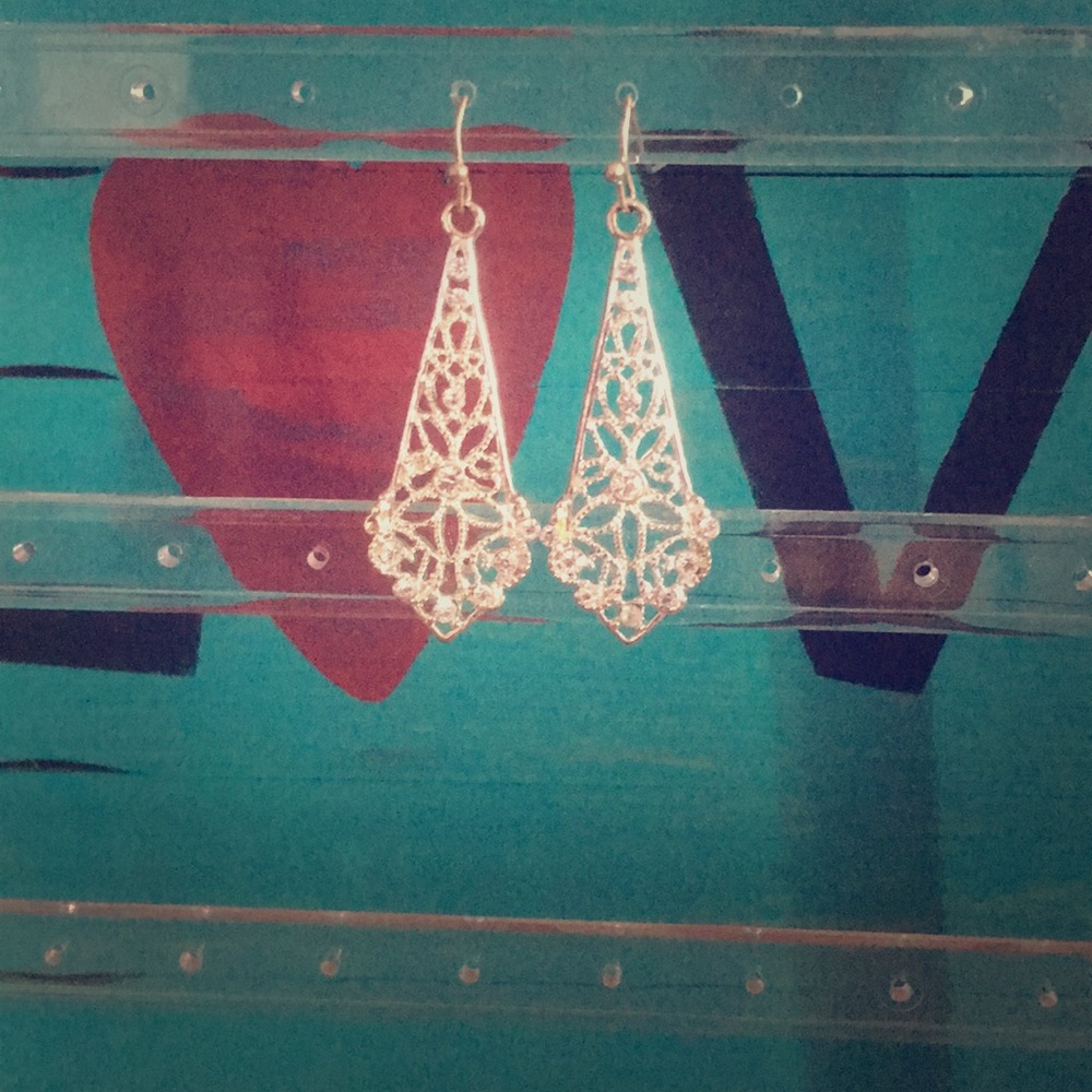 Silver earrings with flowers indented 3/$10 5/$5